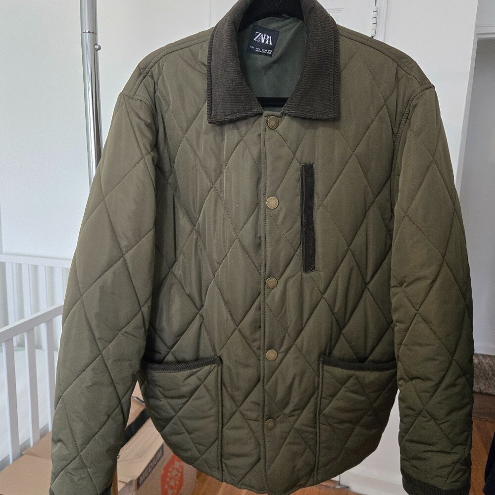 Zara quilted jacket in olive green with a corduroy collar and trim.